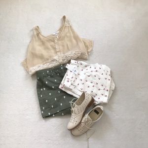 Two pairs of shorts!! One green and one white.NWT